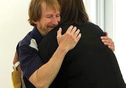 Warm embrace between friends
