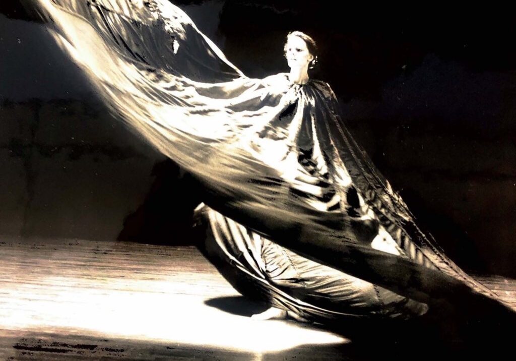 Graceful performance in dramatic lighting