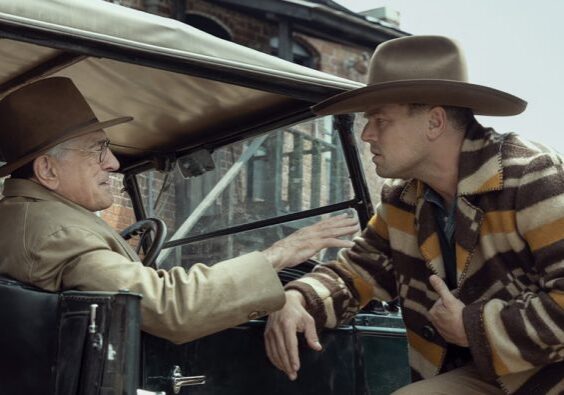 Men in hats having a conversation.