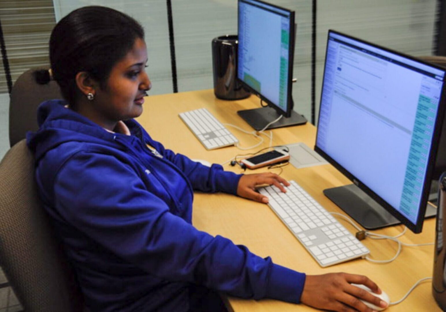Office worker typing on keyboard