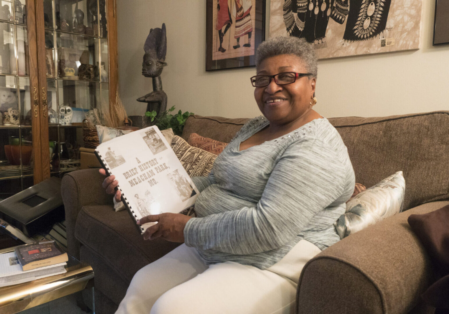 Person displaying a family photo album