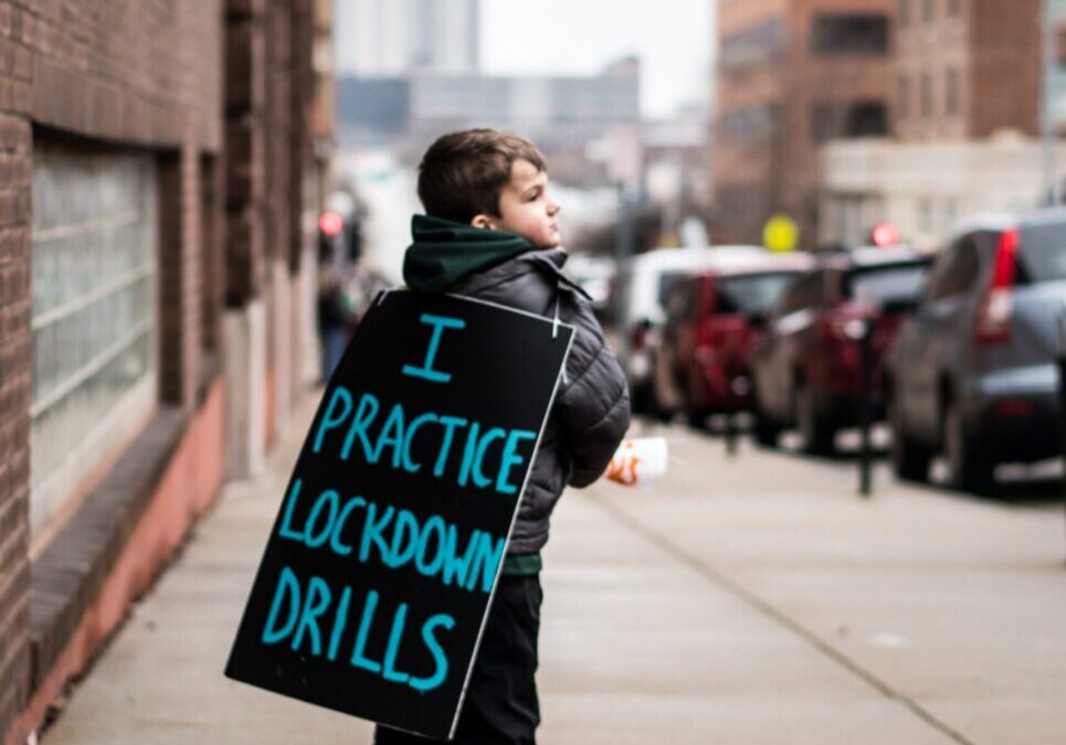 Urban scene with child and protest message