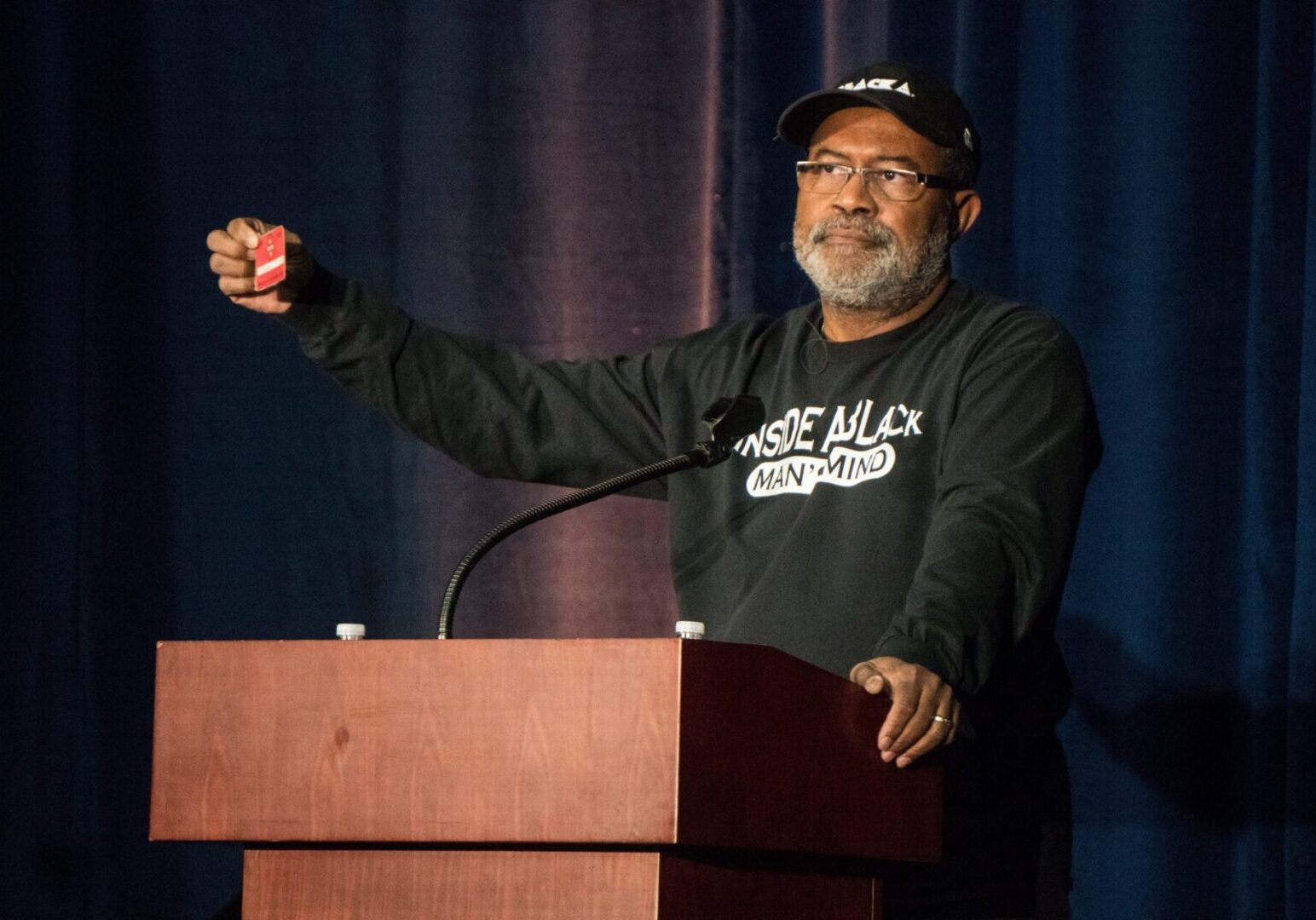 Man speaking at a podium