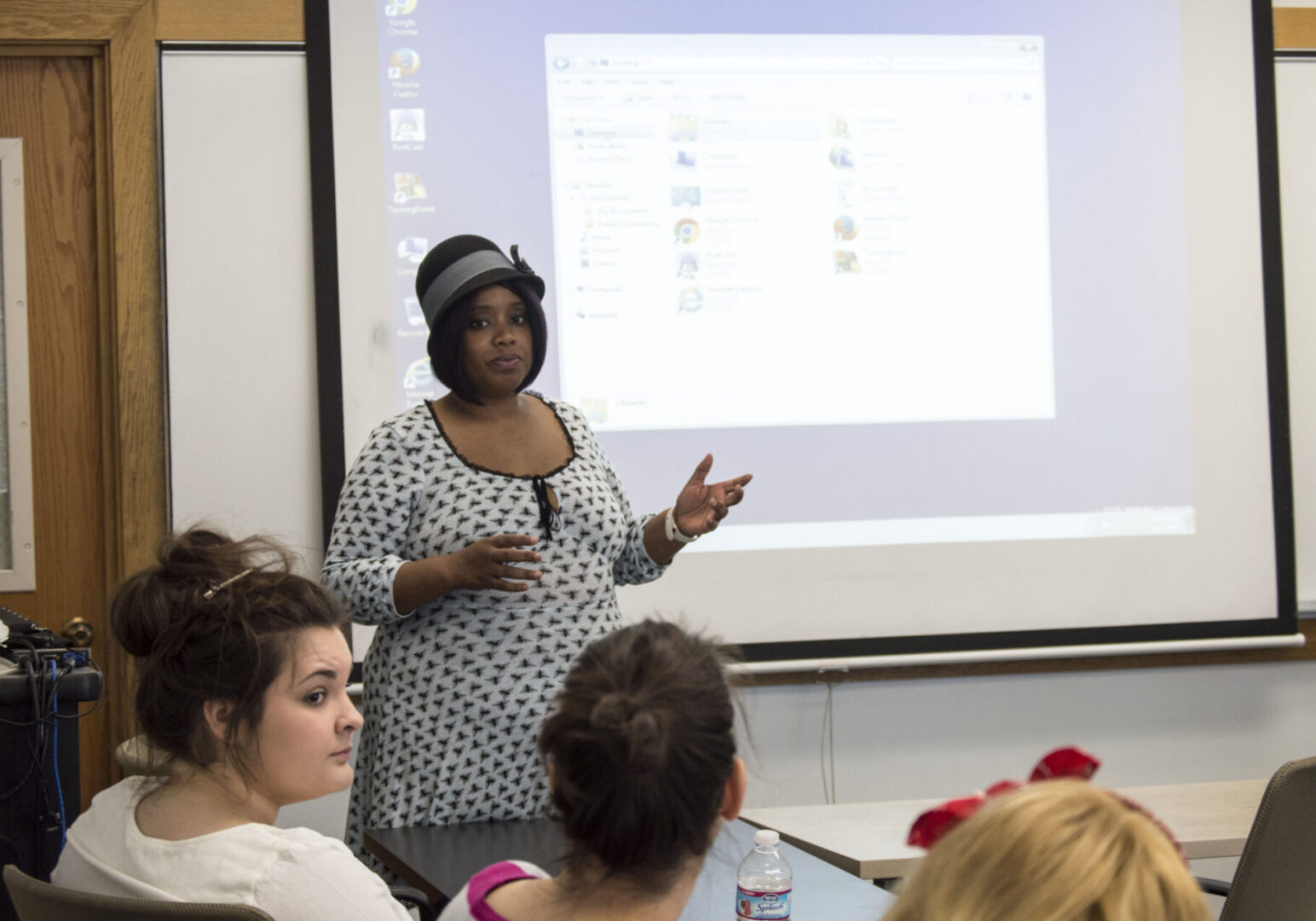Teacher presenting to students in classroom
