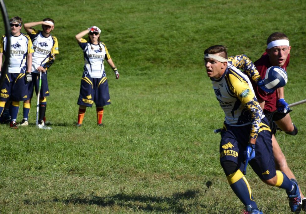 Intense quidditch match action outdoors