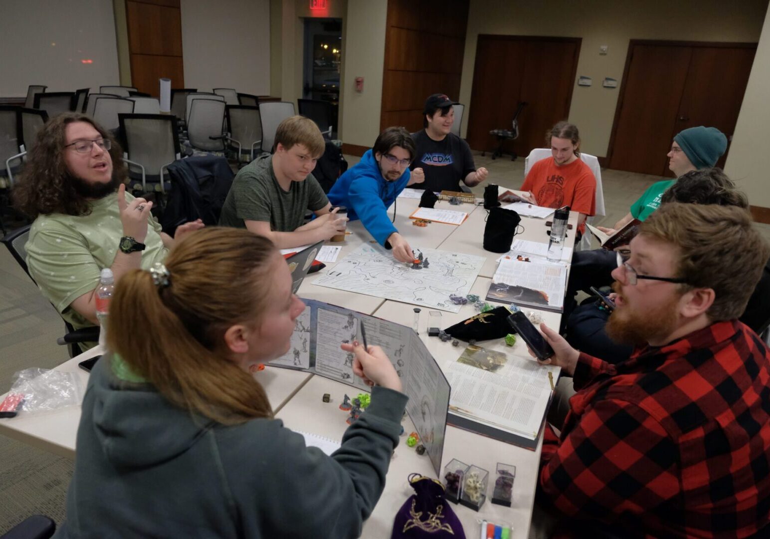 People engaged in a tabletop role-playing game