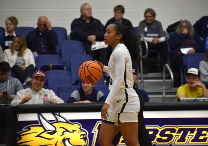 Basketball player dribbling during a game