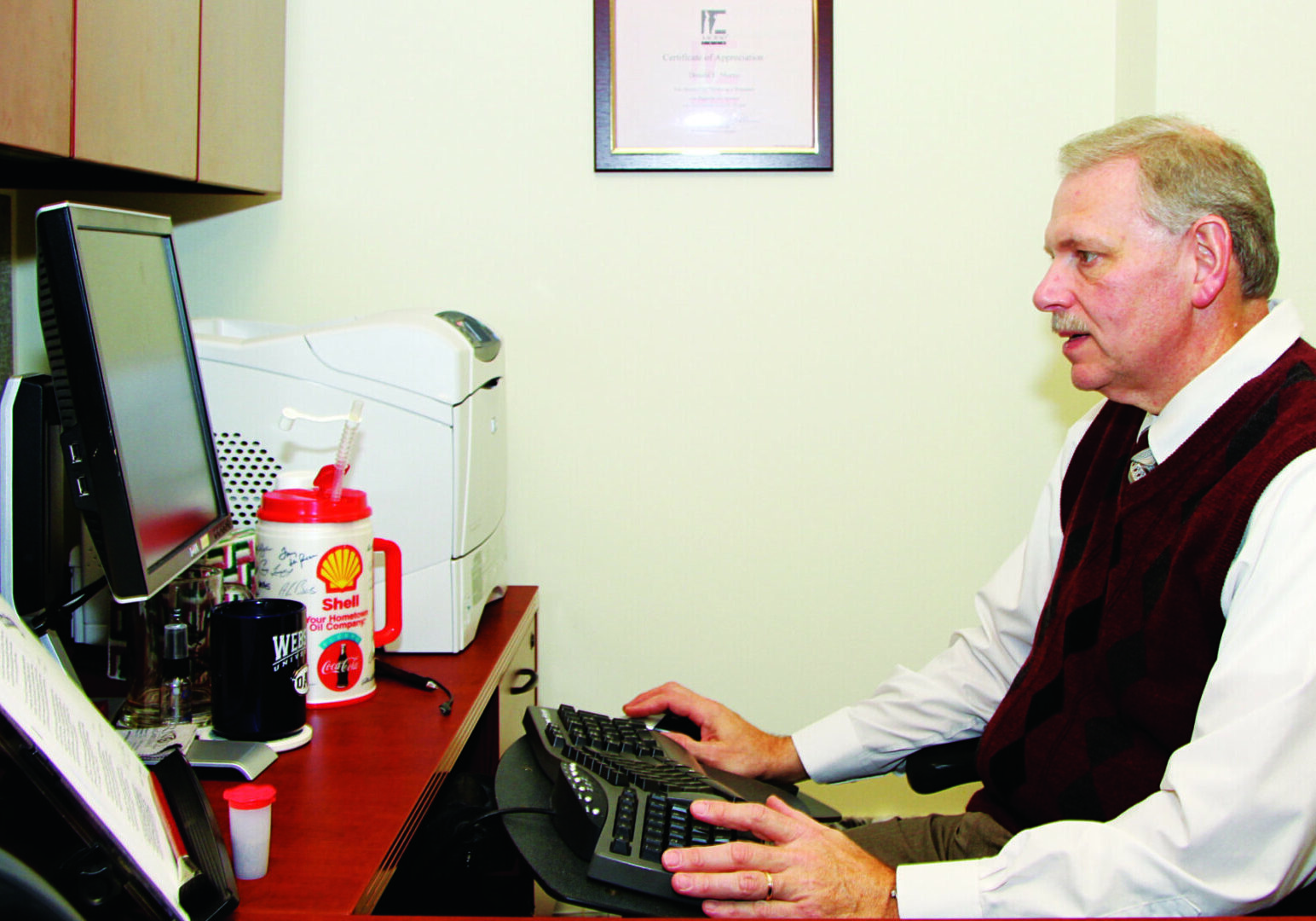 Man working at a desk computer