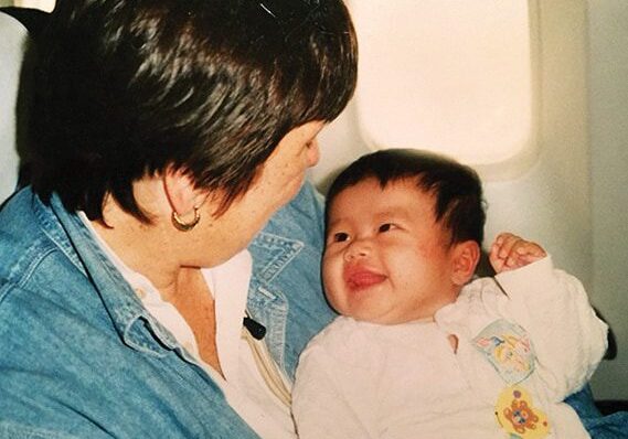 Baby and woman sharing a joyful moment