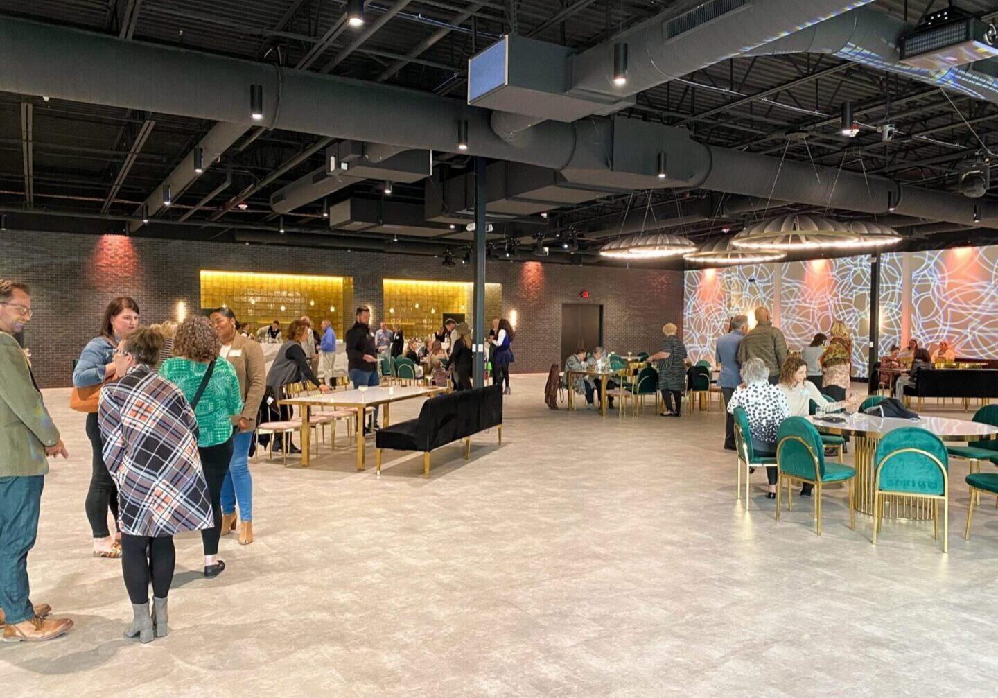 People mingling at a modern event venue