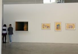People observing art in a gallery