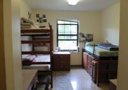 College dorm room with bunk beds
