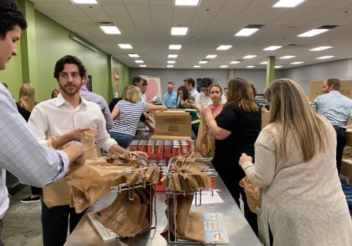 People organizing food items