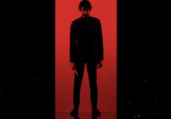 Dark silhouette against red background