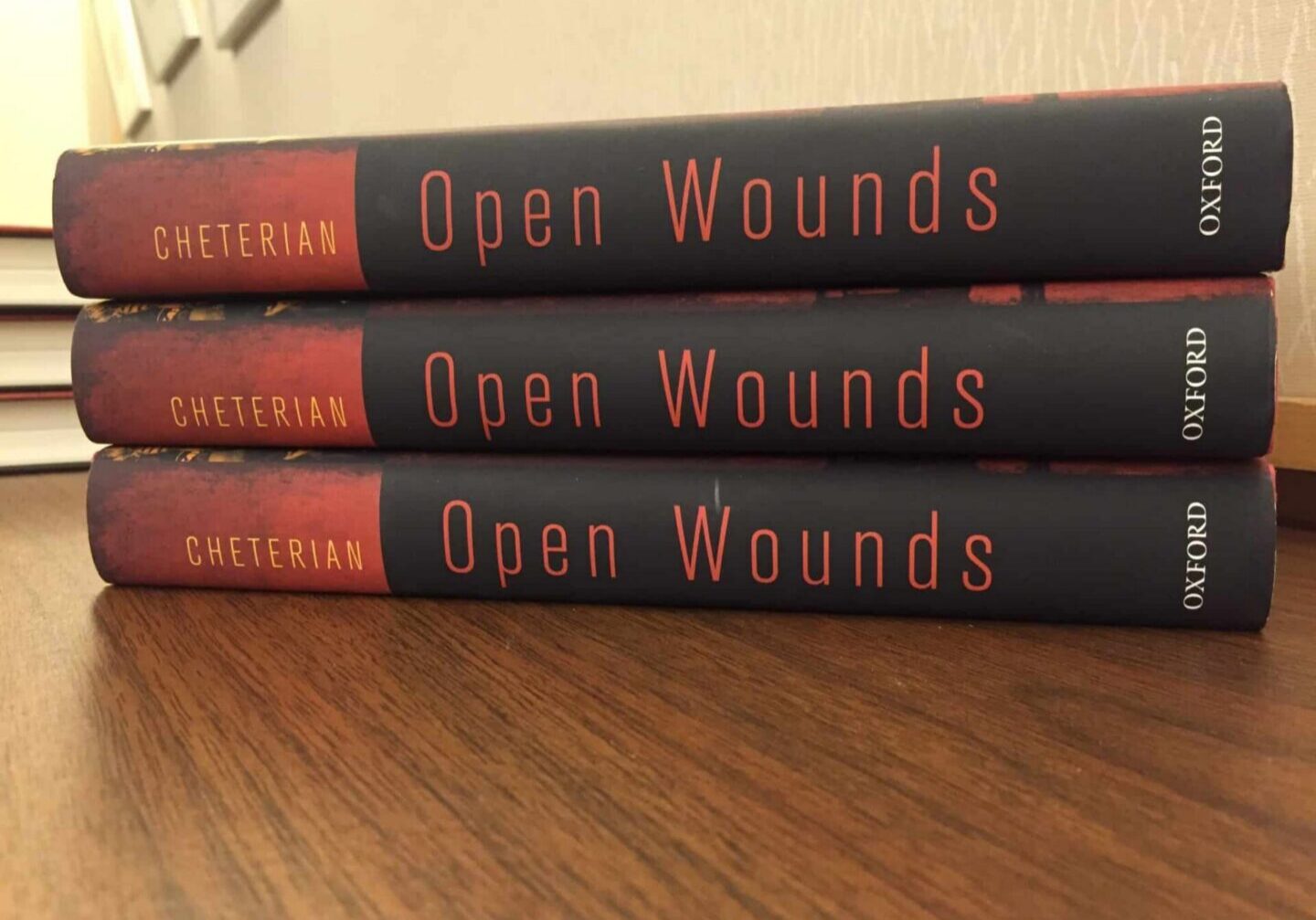 Three copies of "Open Wounds