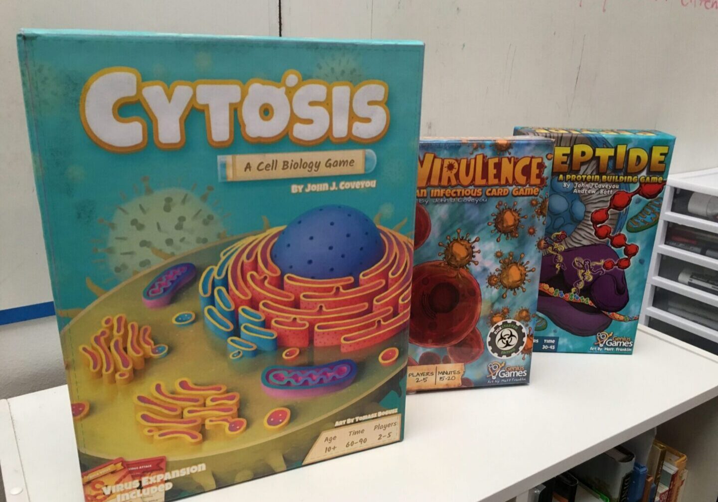 Cell biology board games on shelf
