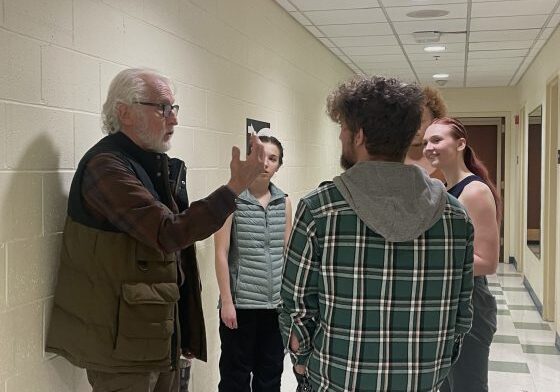 Group discussion in a hallway
