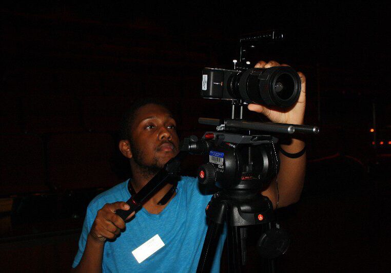 Person operating a professional video camera