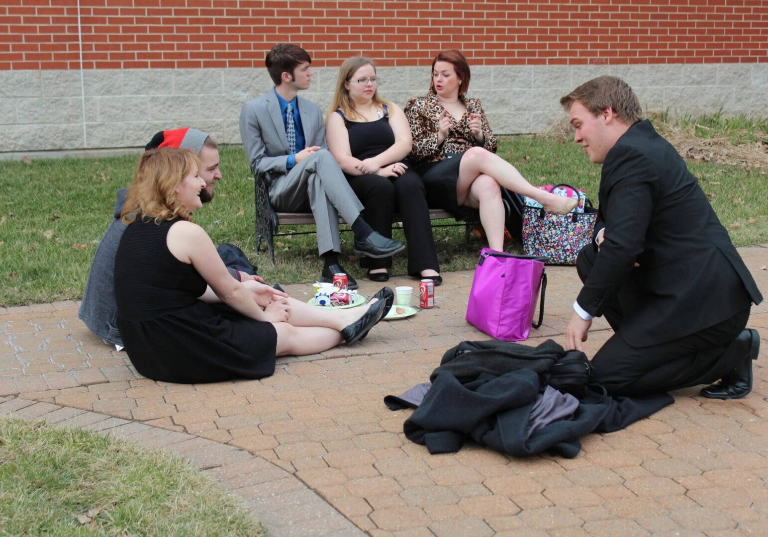 Friends enjoying a picnic outside