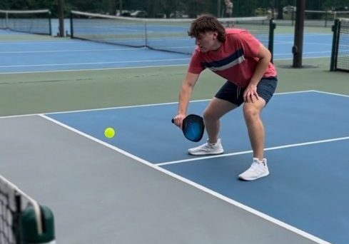 Young athlete focusing on pickleball game