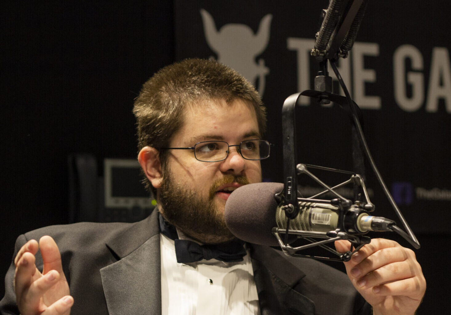 Man speaking into a microphone