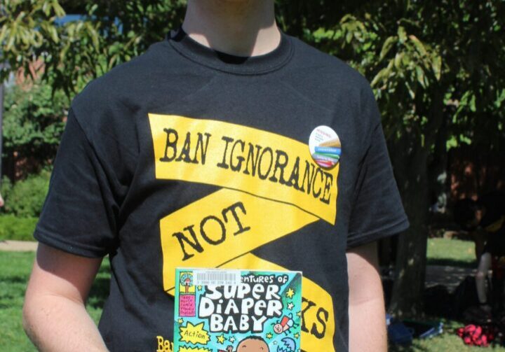 Individual wearing a "Ban Ignorance" shirt