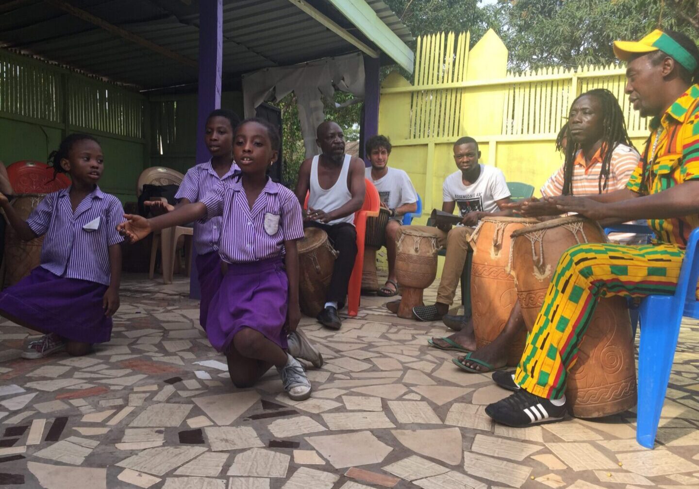 Group drumming session with children
