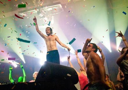 Concert crowd celebrating with confetti