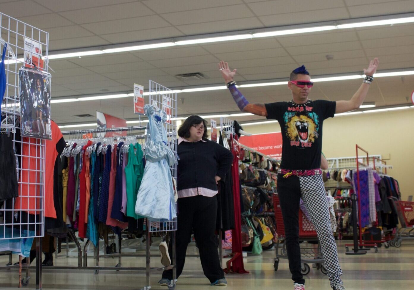 Colorful outfits and shopping racks