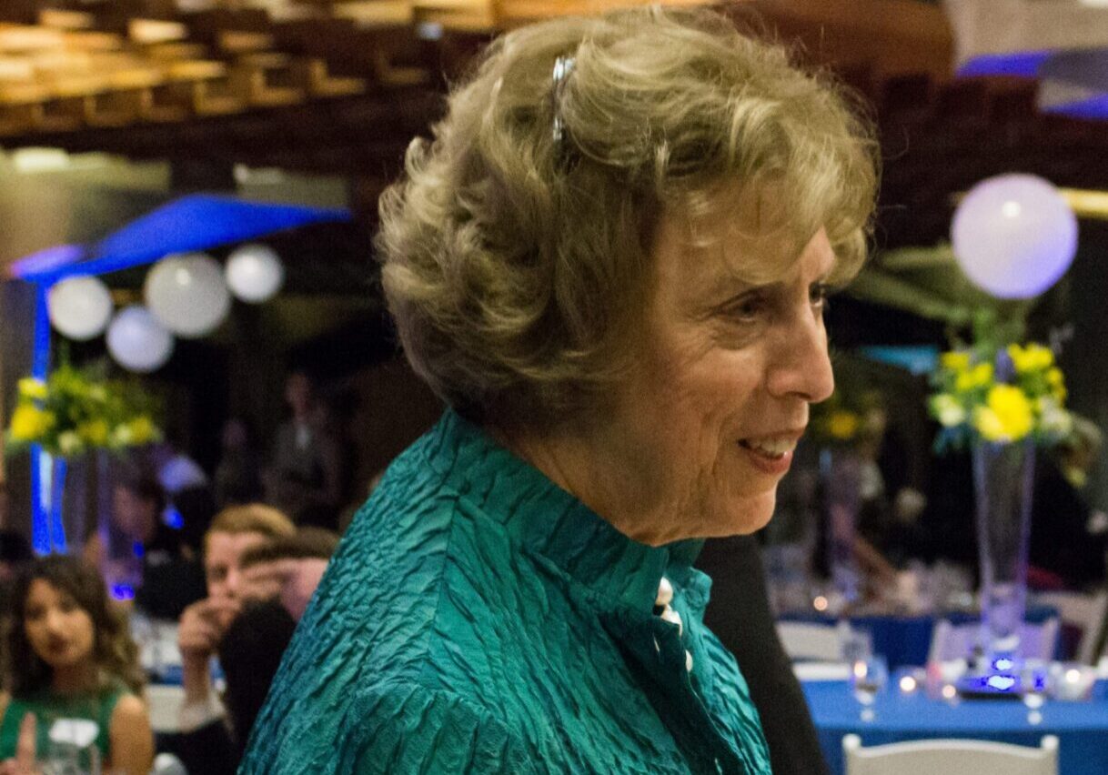 Smiling woman at festive occasion