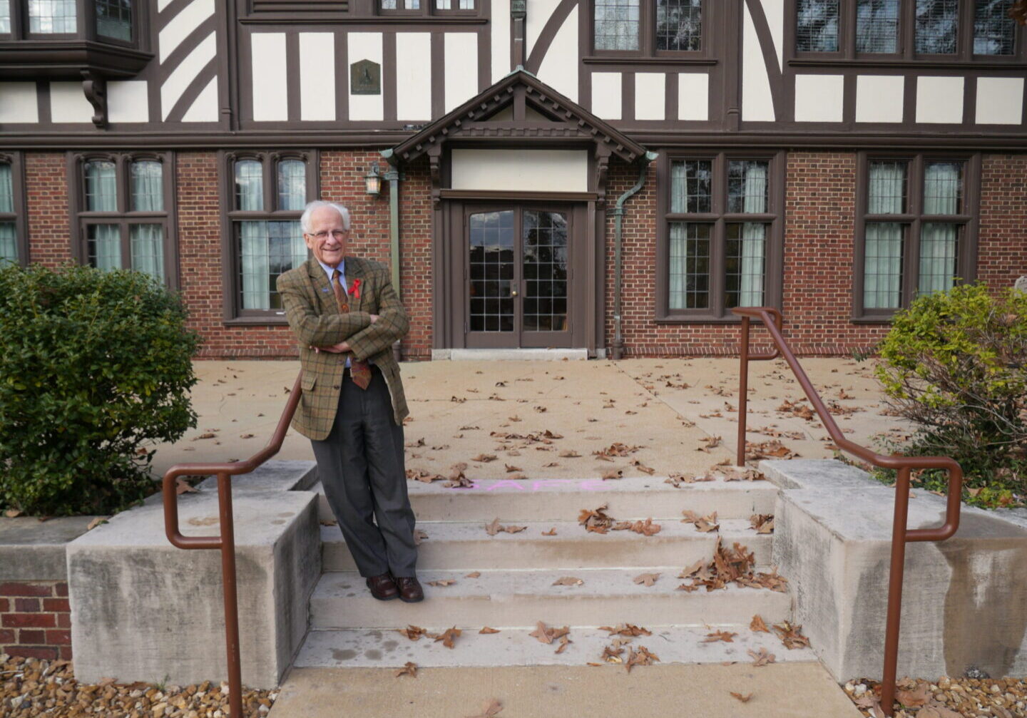 Gentleman posing in front of historic building