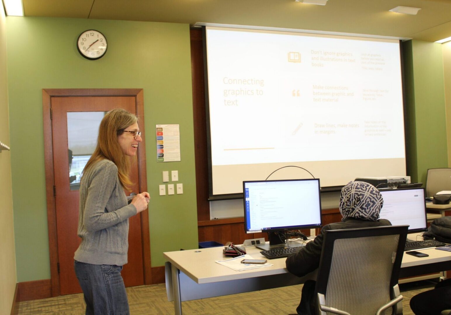 Classroom presentation with students and teacher
