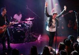 Musicians entertaining crowd at a show