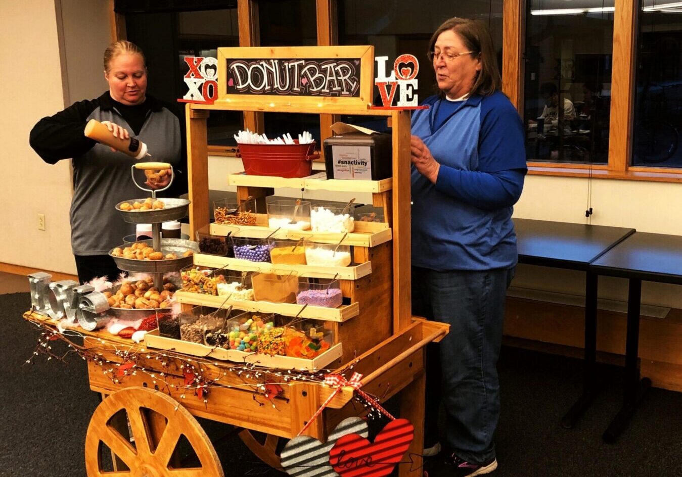 Donut bar with various toppings displayed