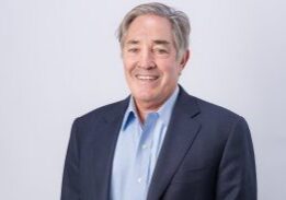 Smiling man in a suit jacket