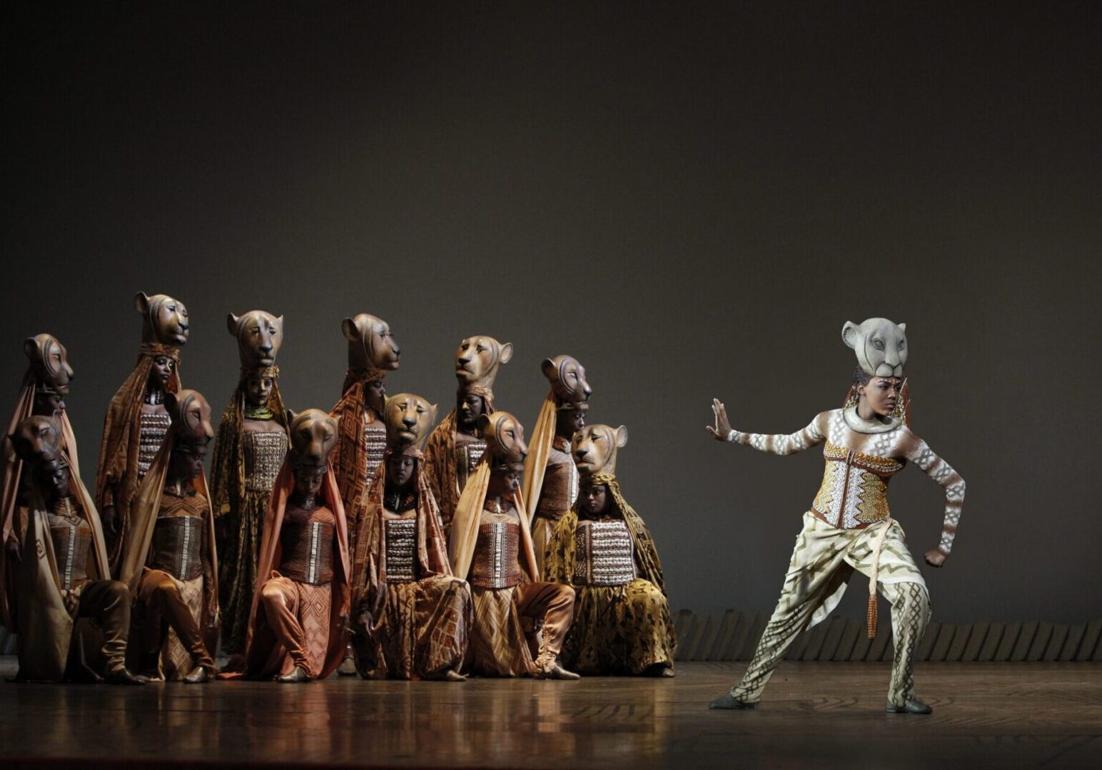 Stage performers in artistic animal attire