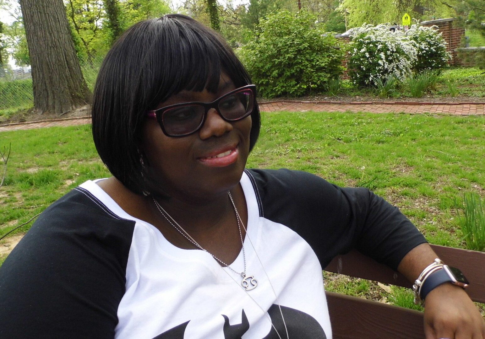 Woman sitting on a park bench
