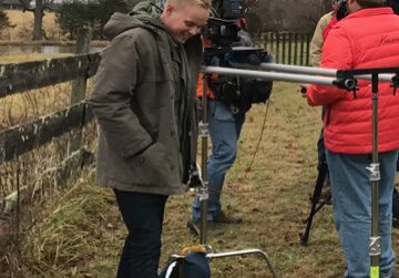 Film crew setting up outdoor scene