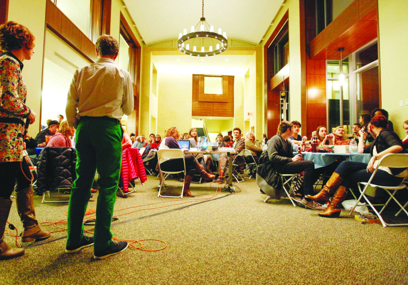People attending a meeting in a hall