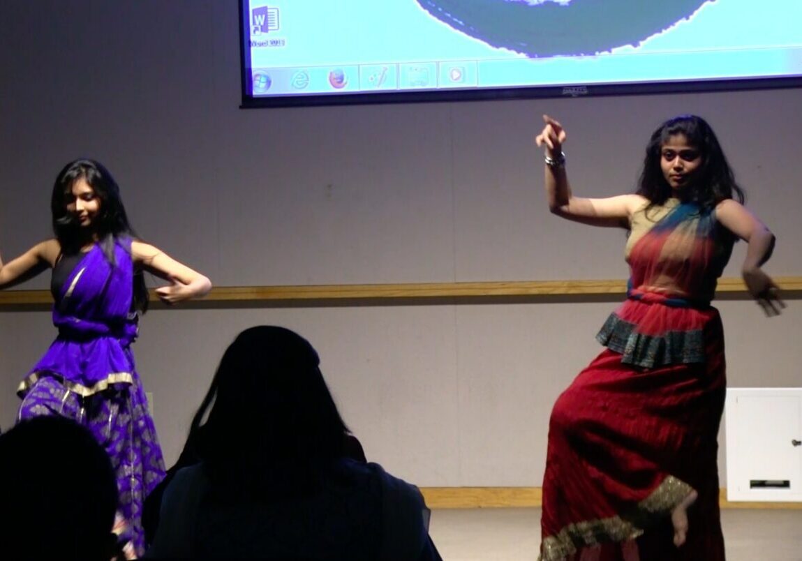 Traditional dance performance with vibrant costumes