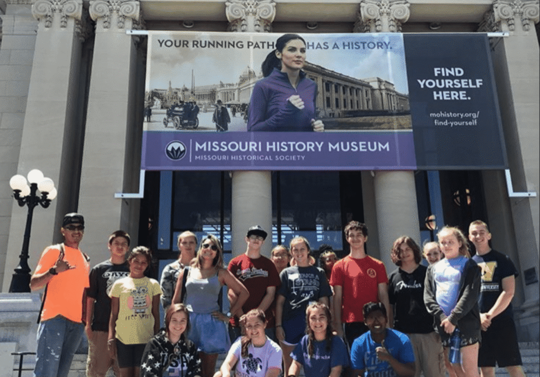 Students pose outside Missouri History Museum