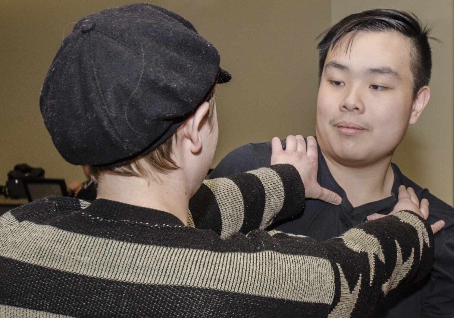 Self-defense training exercise between two individuals