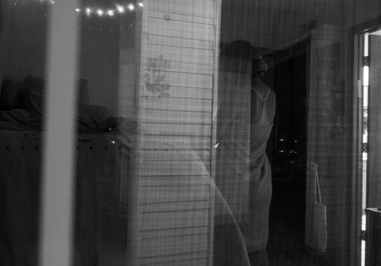 Reflection through window at night