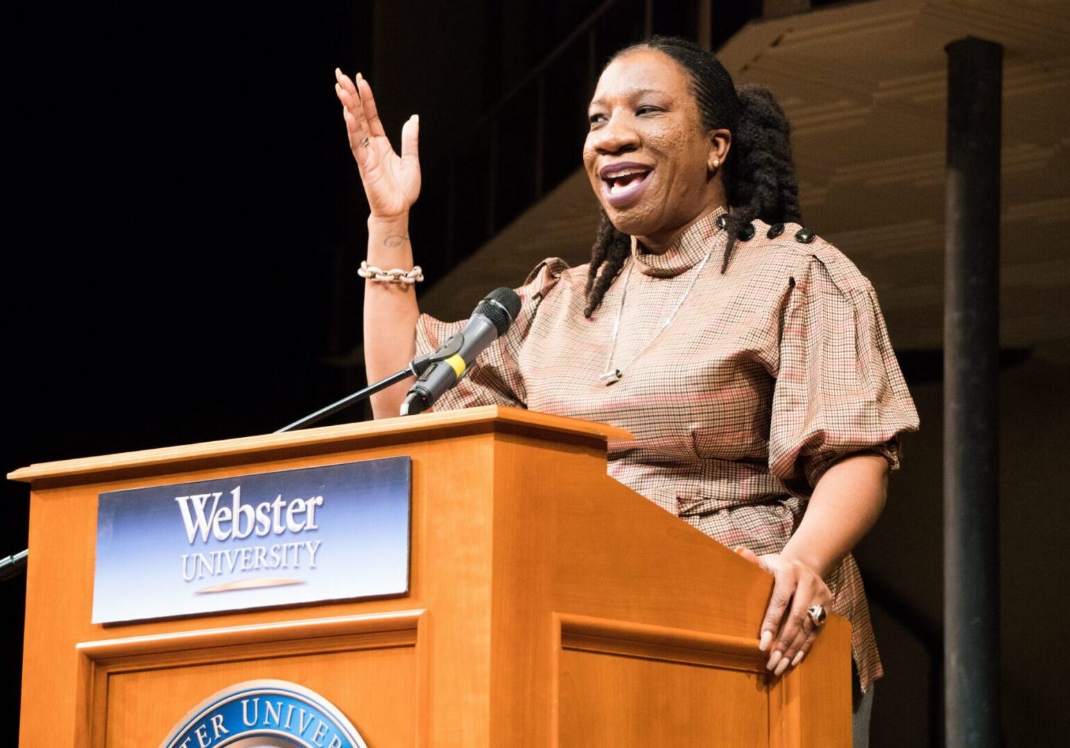 Woman giving a speech at university