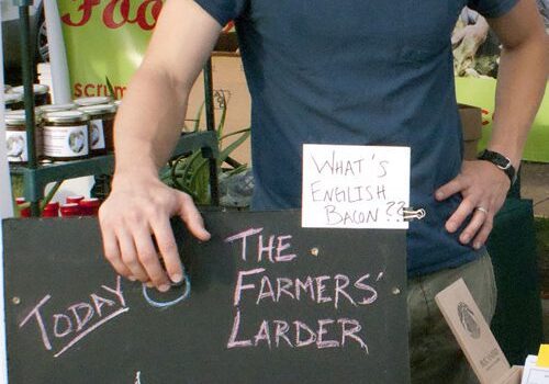 Vendor with chalkboard menu