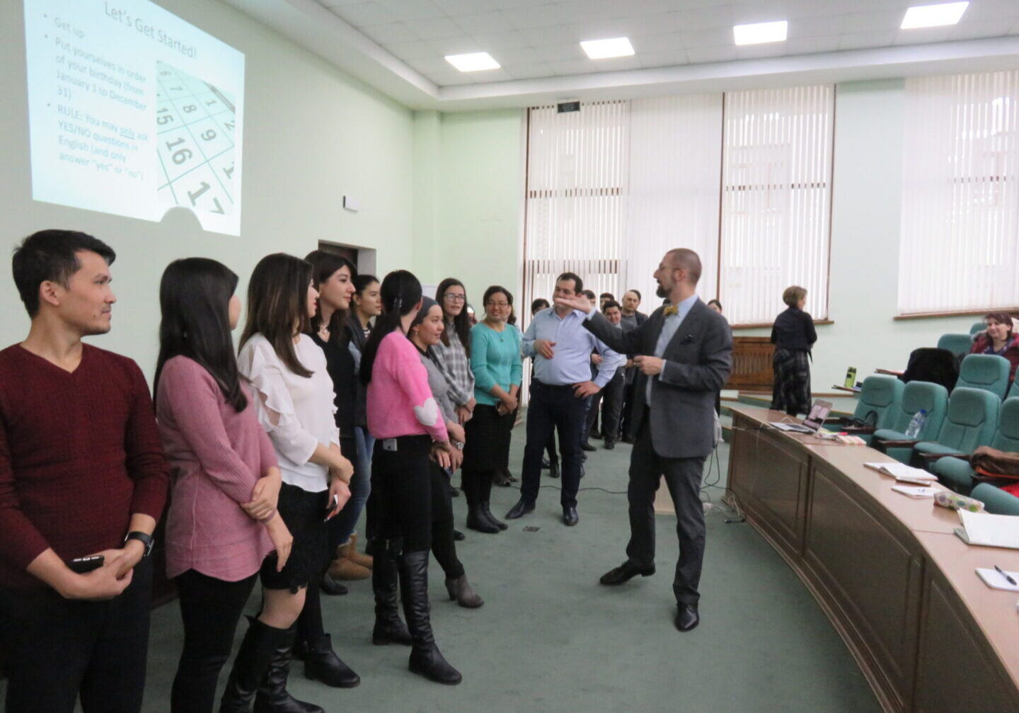 Colleagues standing in a conference room
