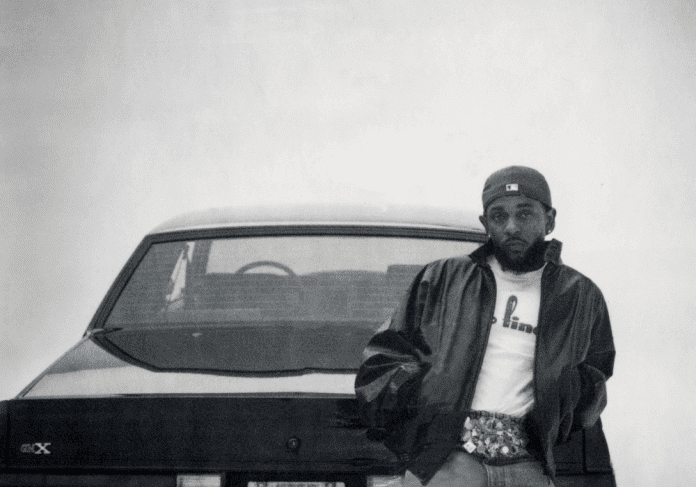 Person standing by an old vehicle