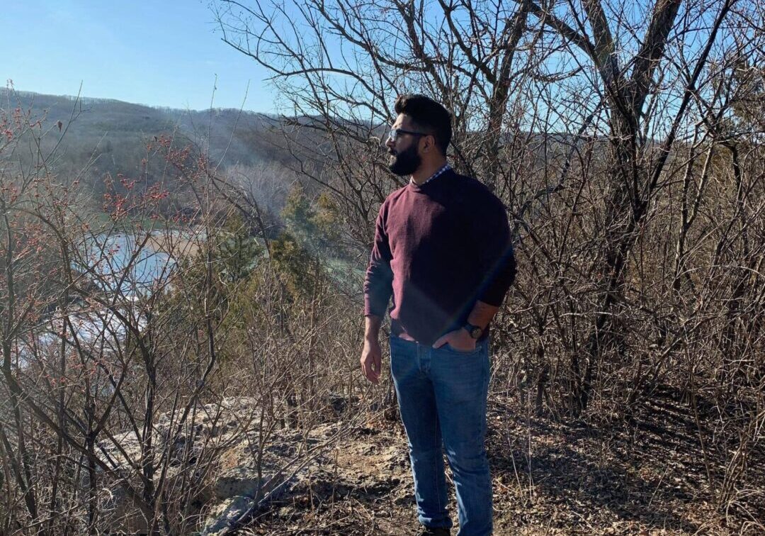 Individual looking at trees and landscape