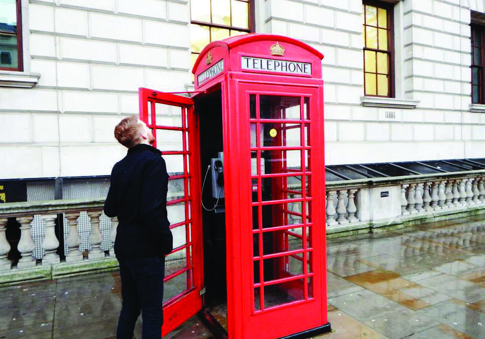 Vintage telephone box in urban setting