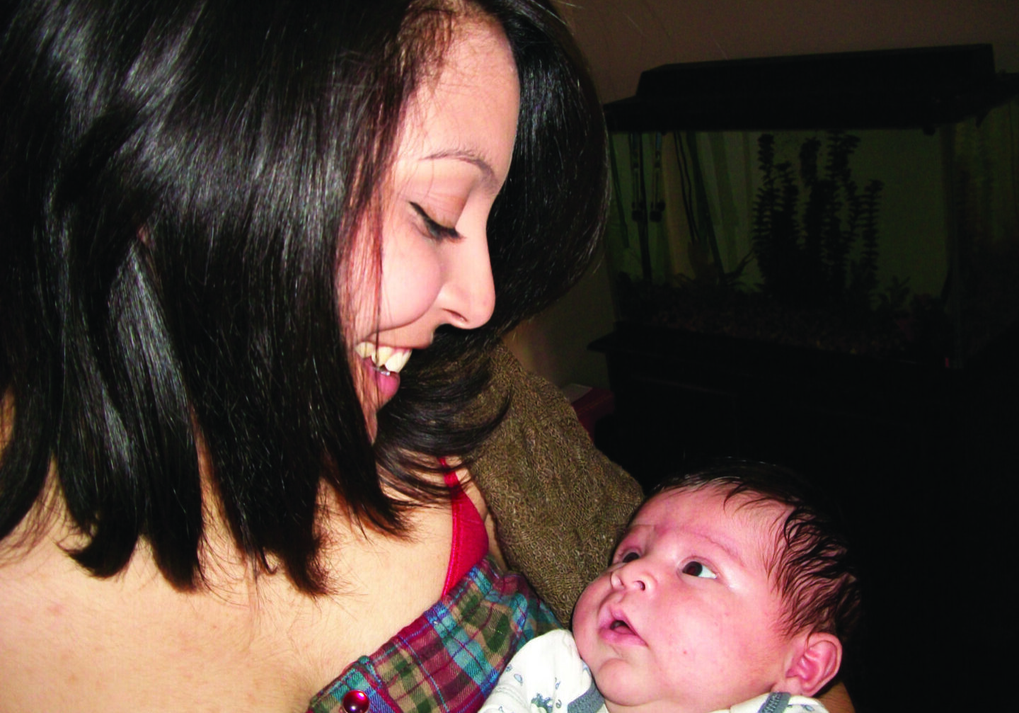 Woman holding newborn baby
